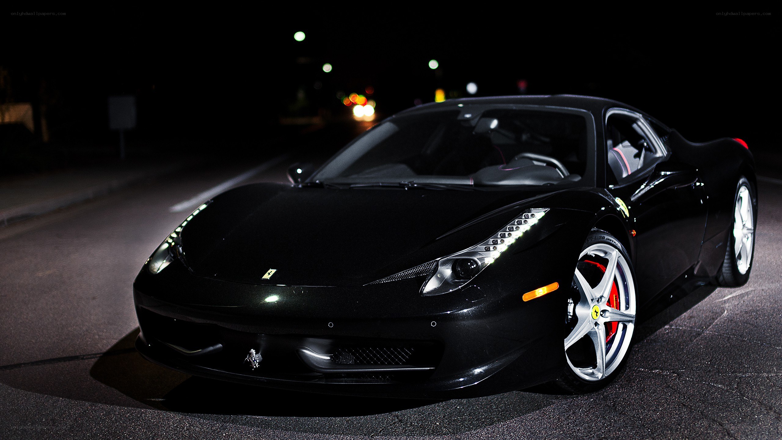 black ferrari at night
