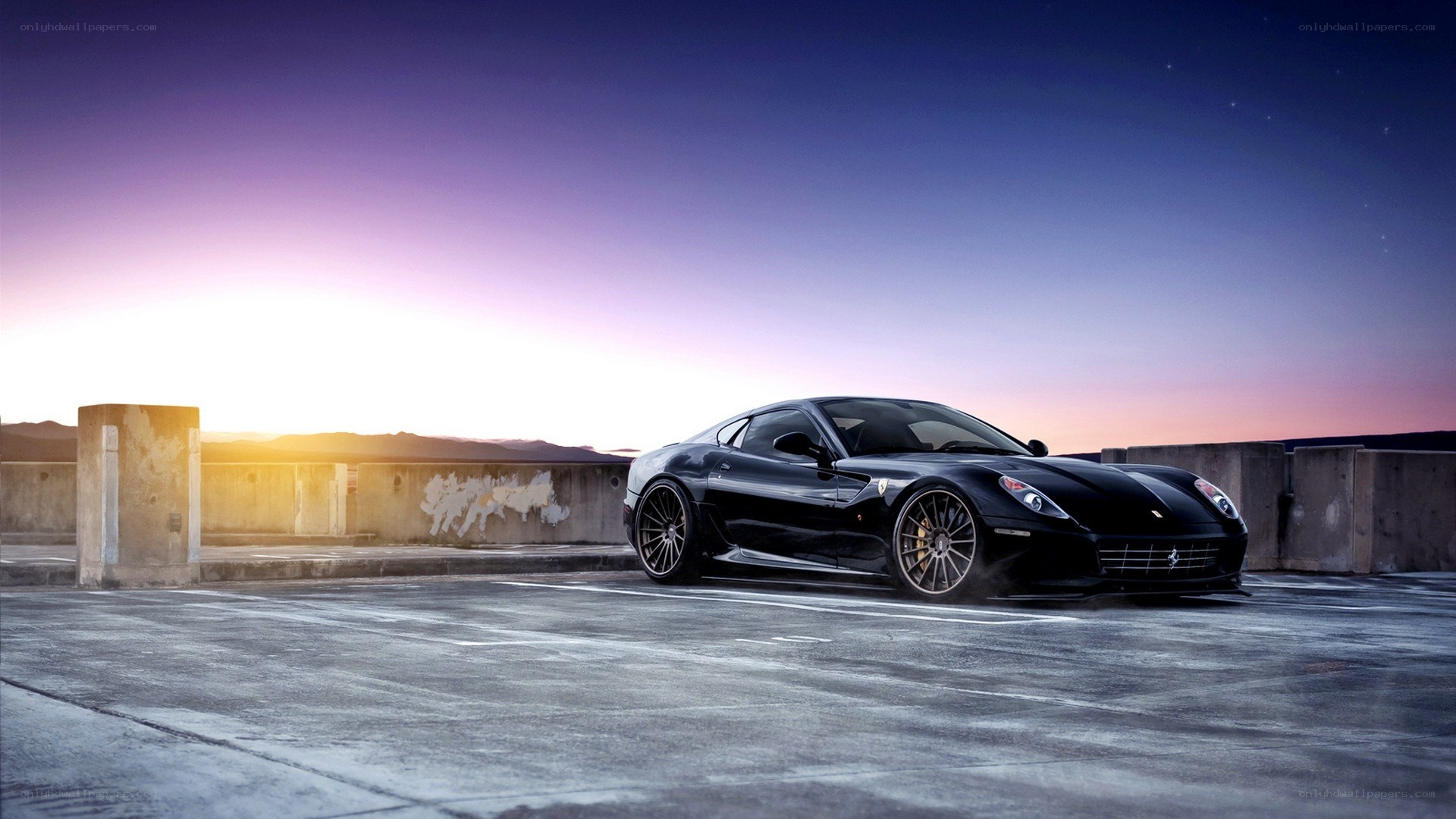 Black Ferrari at sunset