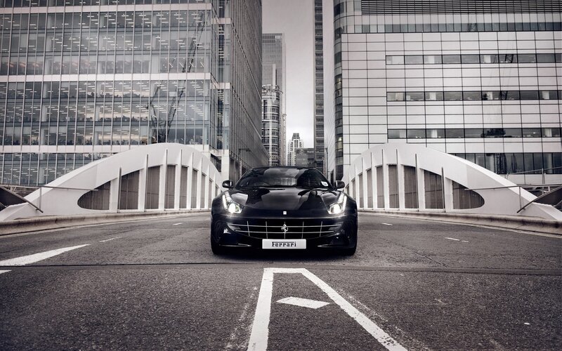 Black Ferrari Car — Dramatic, Photograph, Buildings, Bridge, Road