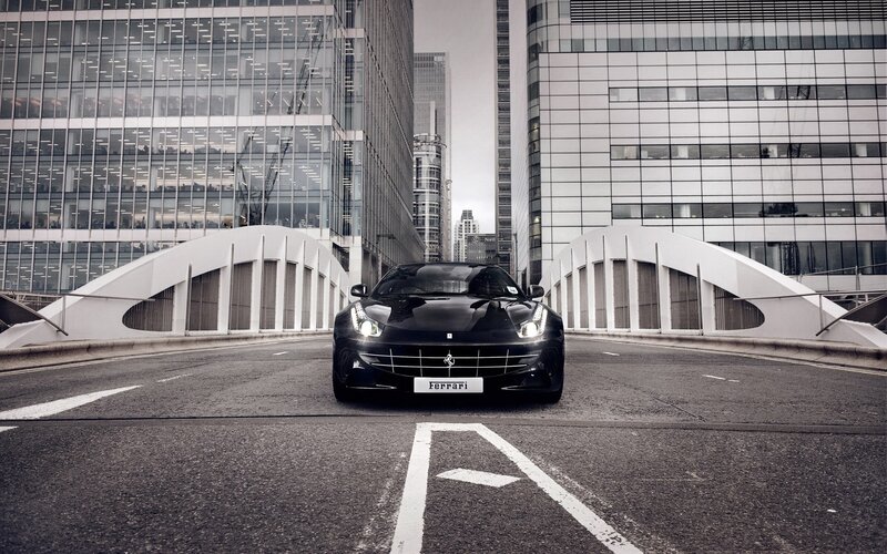 Black Ferrari Car — Dramatic, Photograph, Buildings, Bridge, Road, White