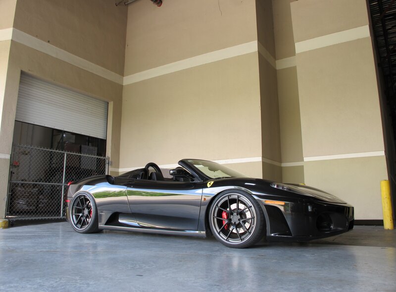 Black Ferrari Convertible — Calm, Photograph, Garage