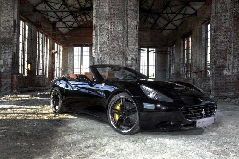 Black Ferrari Convertible — Dramatic, Photograph, Brick Building, Windows, Concrete Floor