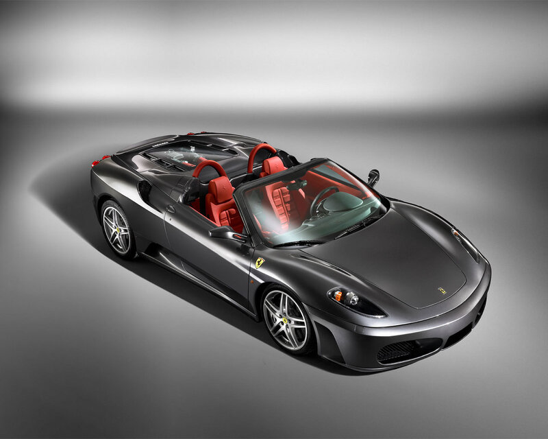 Black Ferrari Convertible — Gray, Dramatic, Photograph, Red Seats, Silver Wheels, Open Top, Red