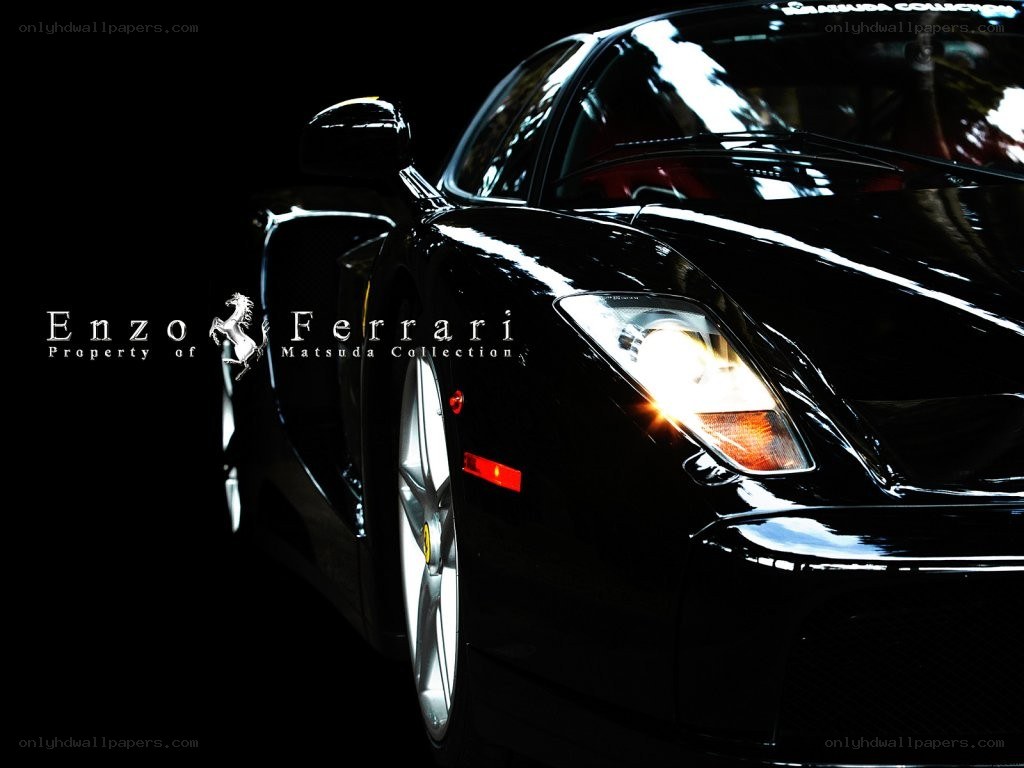 Black Ferrari Enzo in dark setting