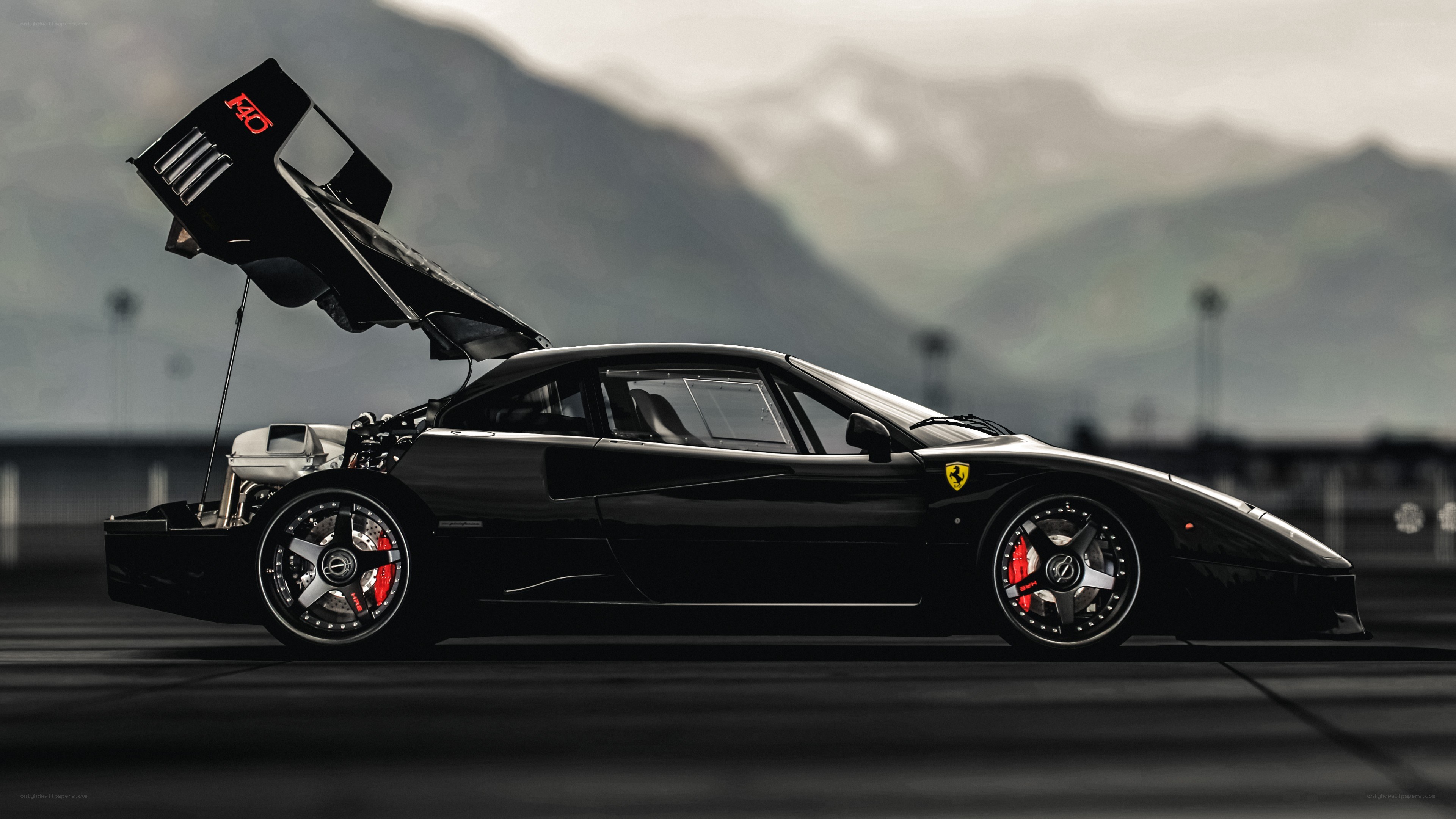 Black Ferrari F40 with open engine