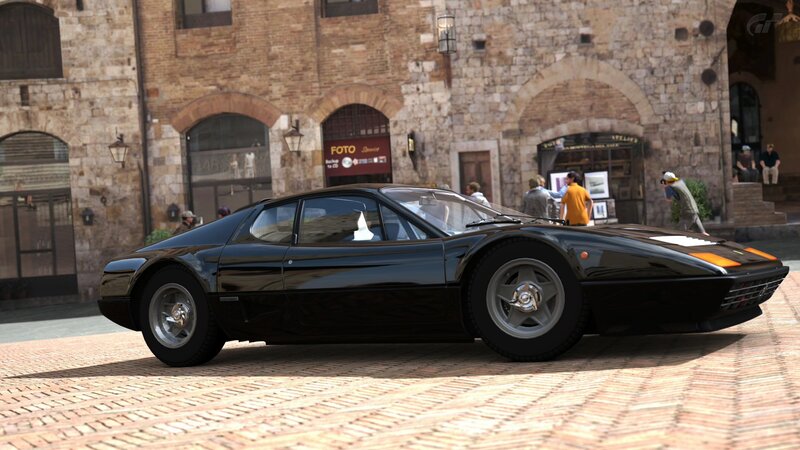 Black Ferrari in a town square