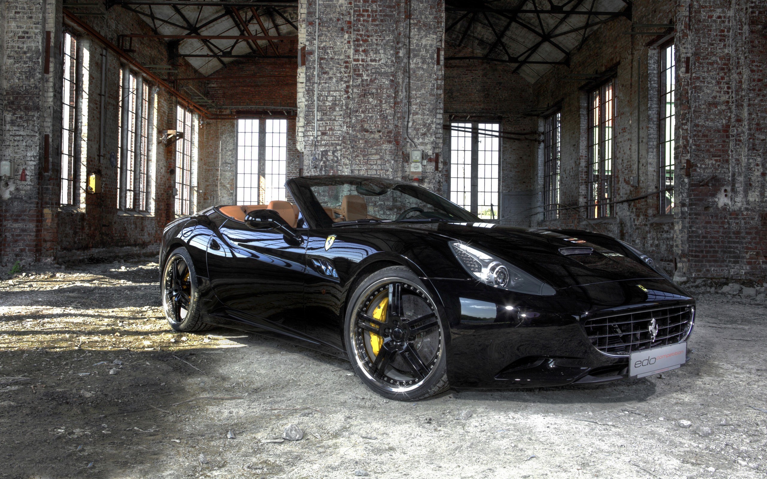 Black Ferrari in an old warehouse