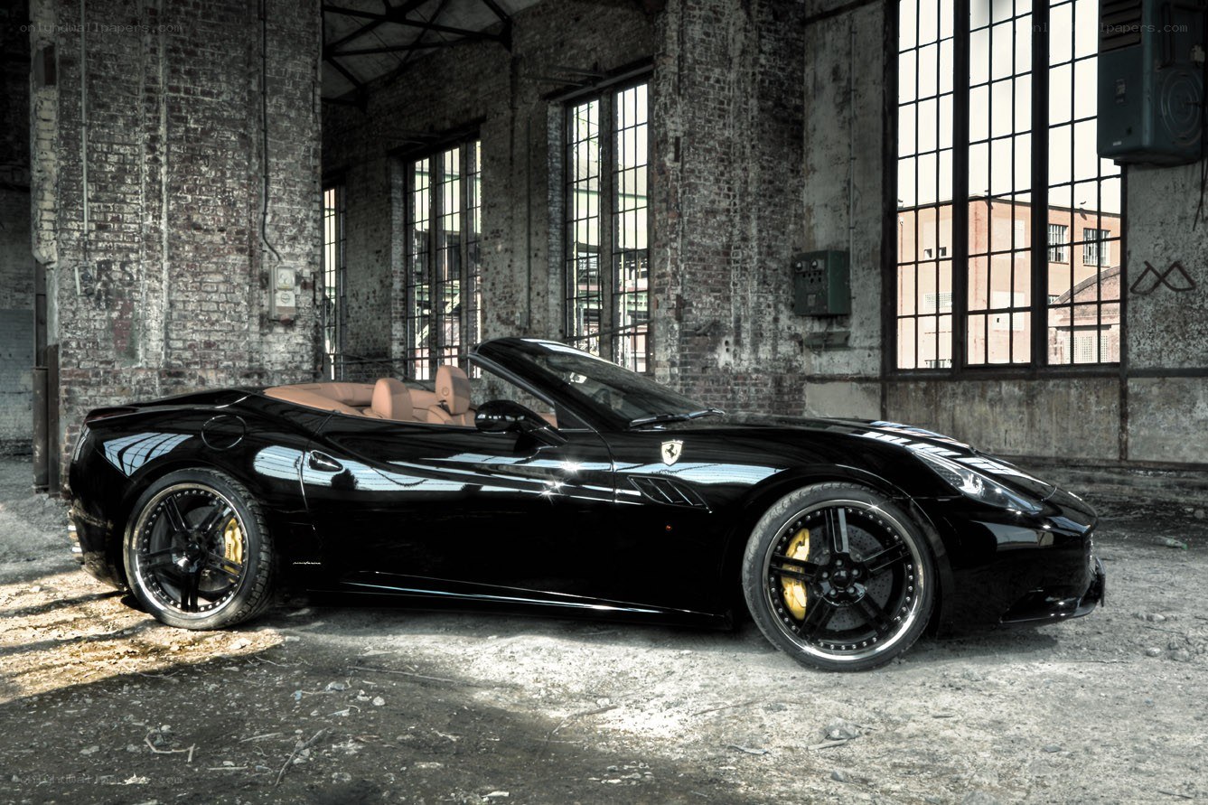 Black Ferrari in an old warehouse