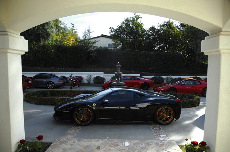 Black Ferrari in Driveway