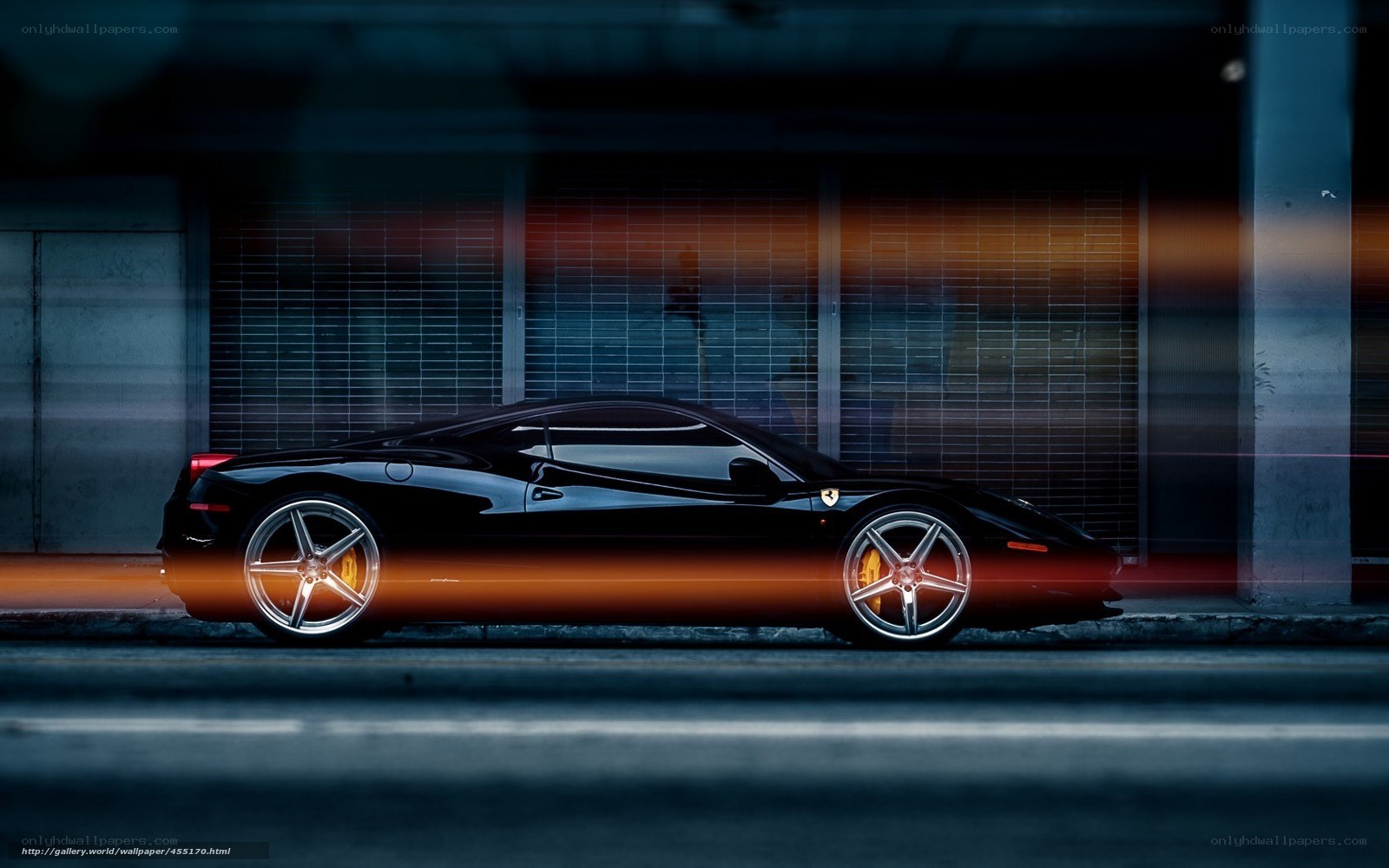 Black Ferrari in motion