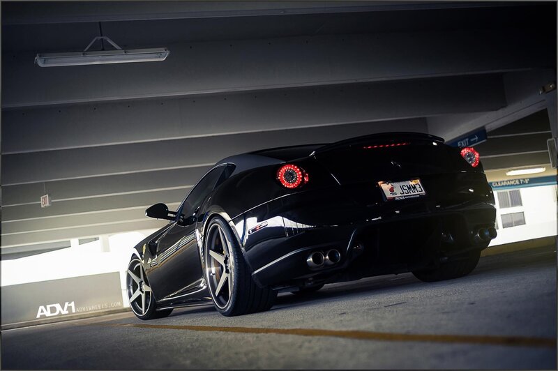 black ferrari in parking garage