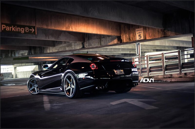 Black Ferrari in parking garage