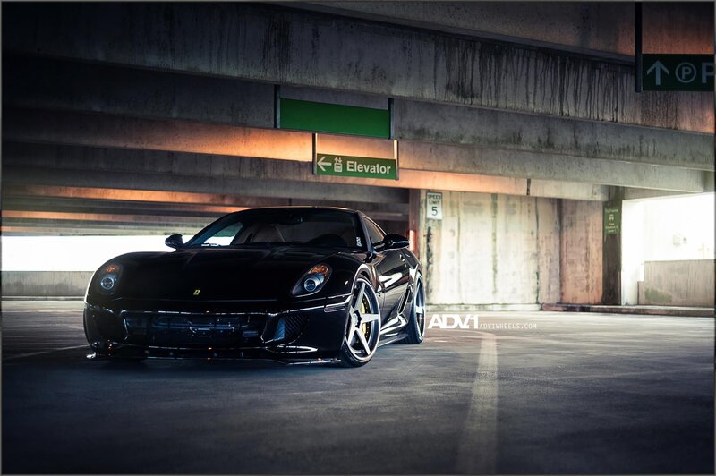 Black Ferrari in parking garage