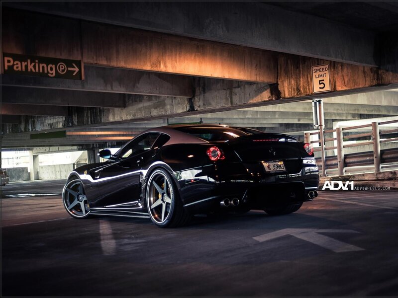 Black Ferrari in parking garage