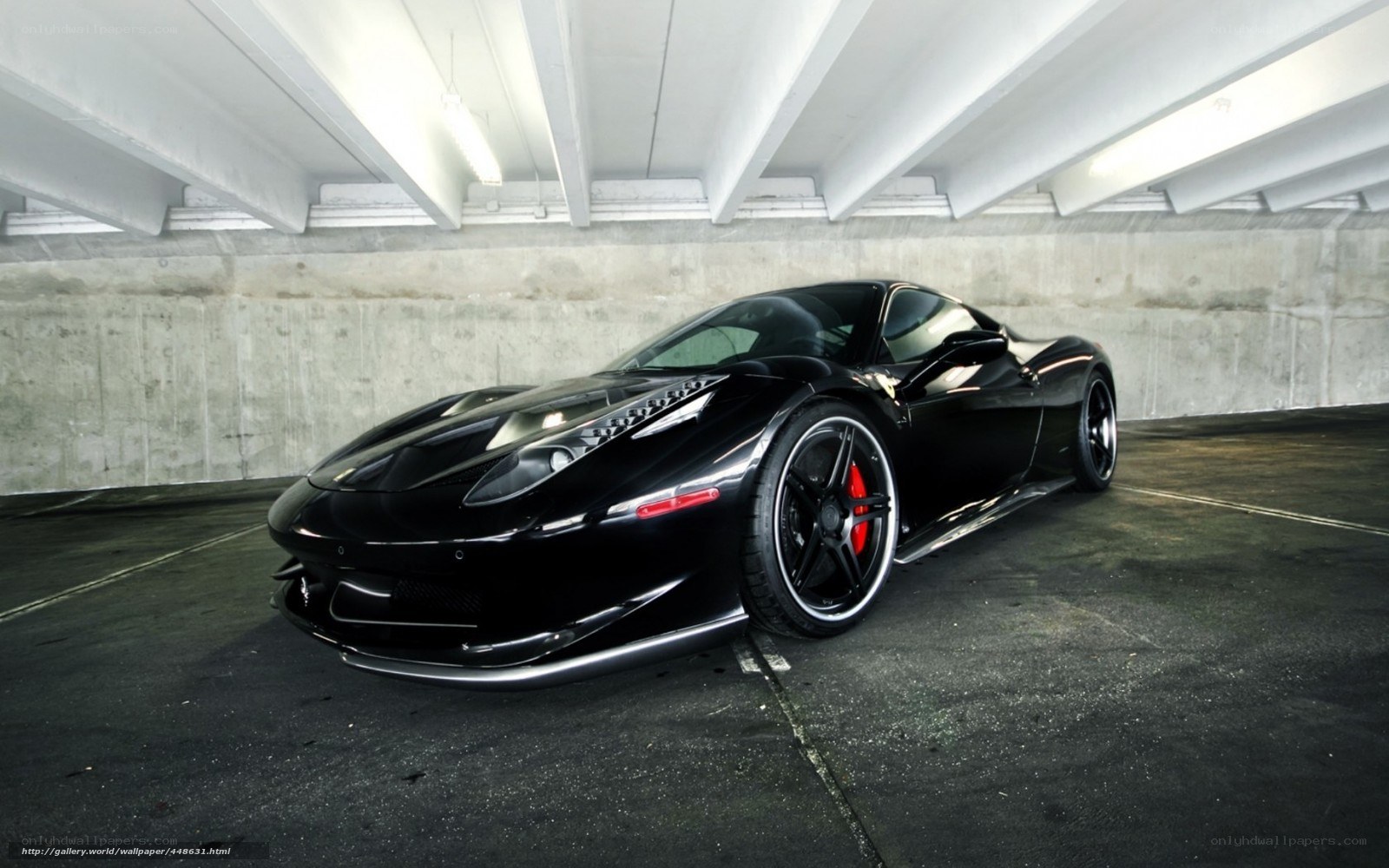 Black Ferrari in parking garage