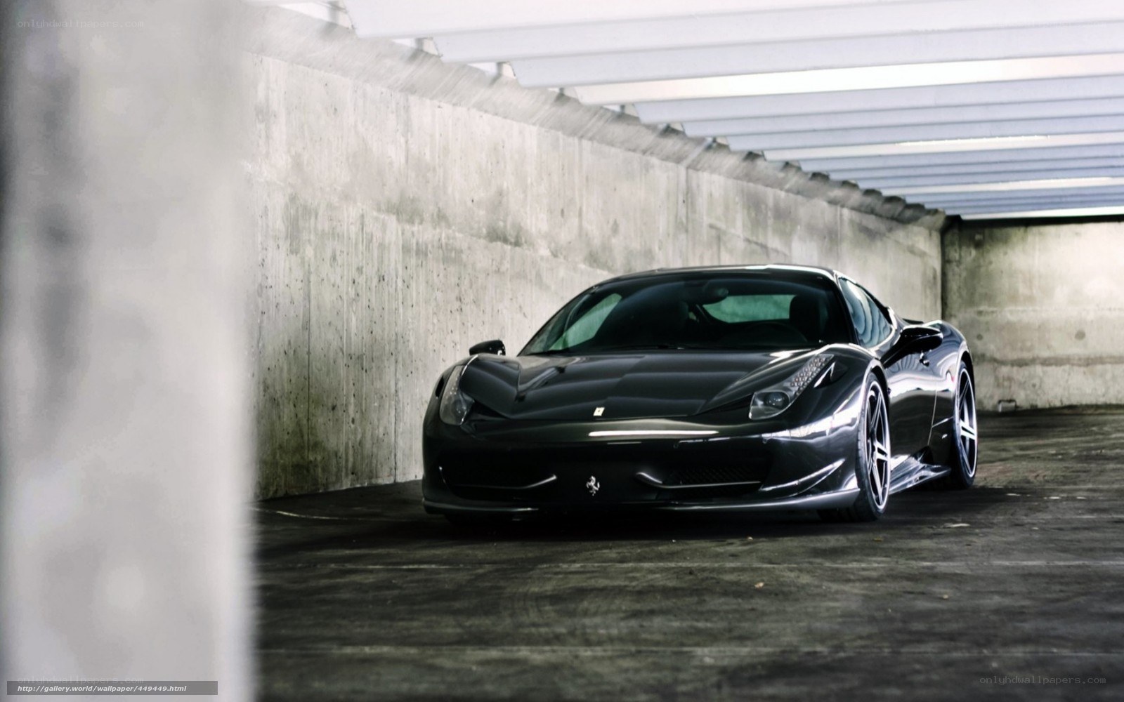 Black Ferrari in parking garage
