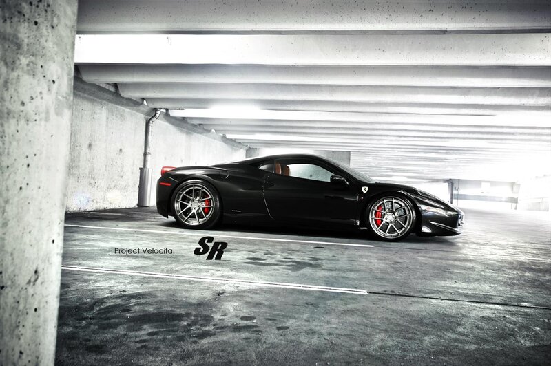 Black Ferrari in parking garage