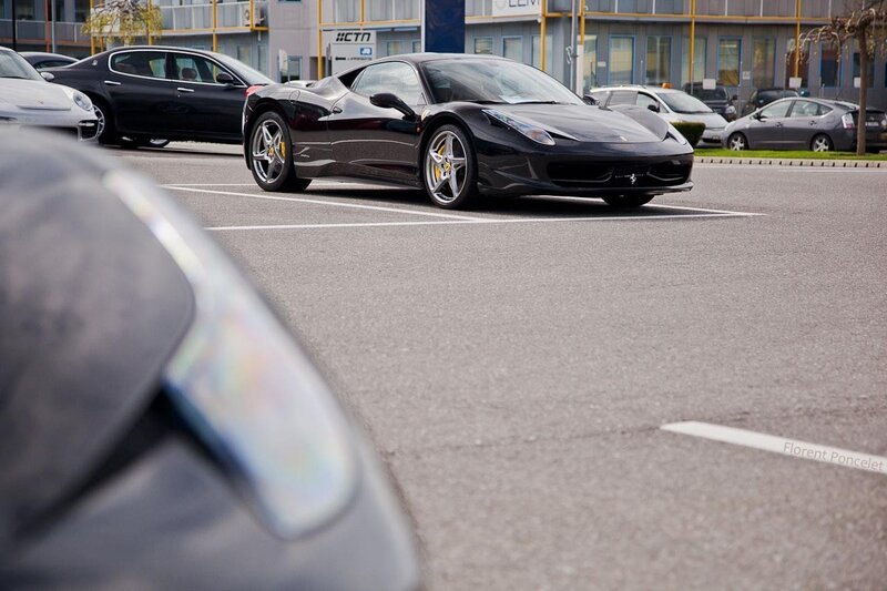 Black Ferrari in parking lot