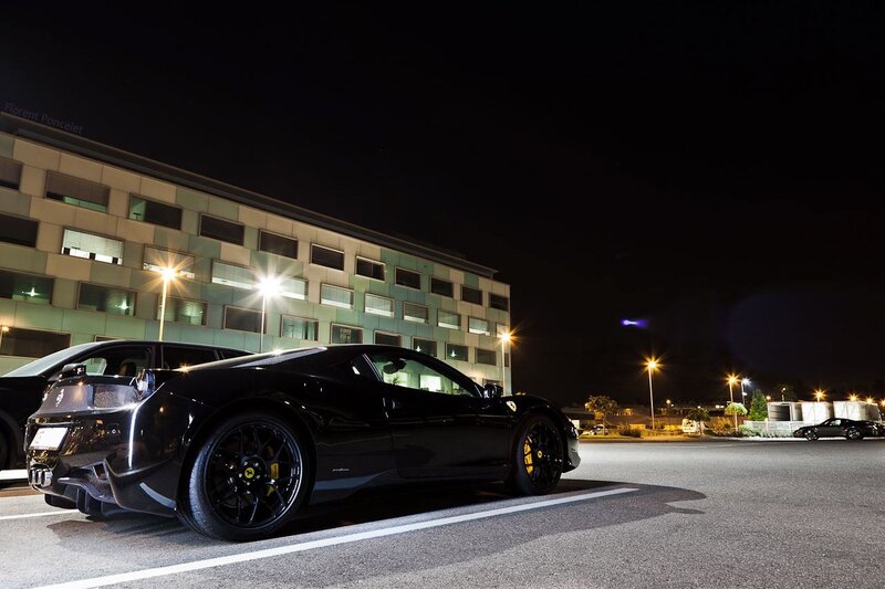 Black Ferrari in parking lot