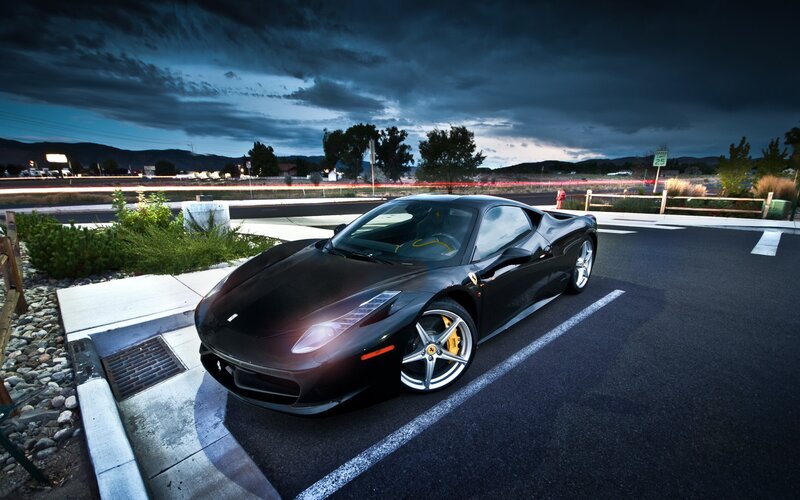 Black Ferrari in parking lot