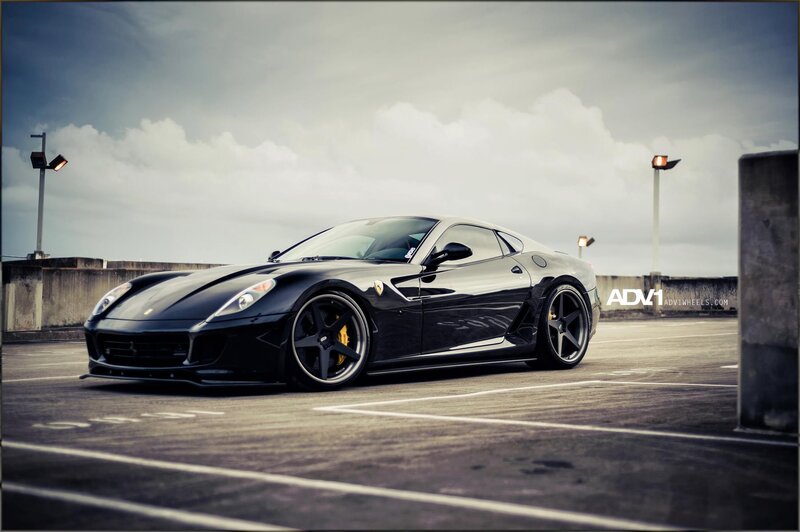 Black Ferrari in parking lot