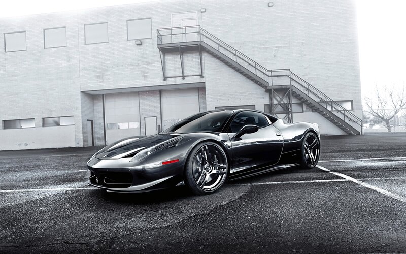 Black Ferrari in parking lot