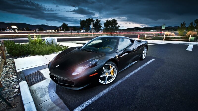 Black Ferrari in parking lot