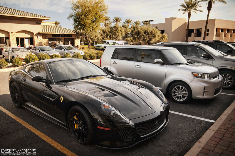 Black Ferrari in Parking Lot — Calm