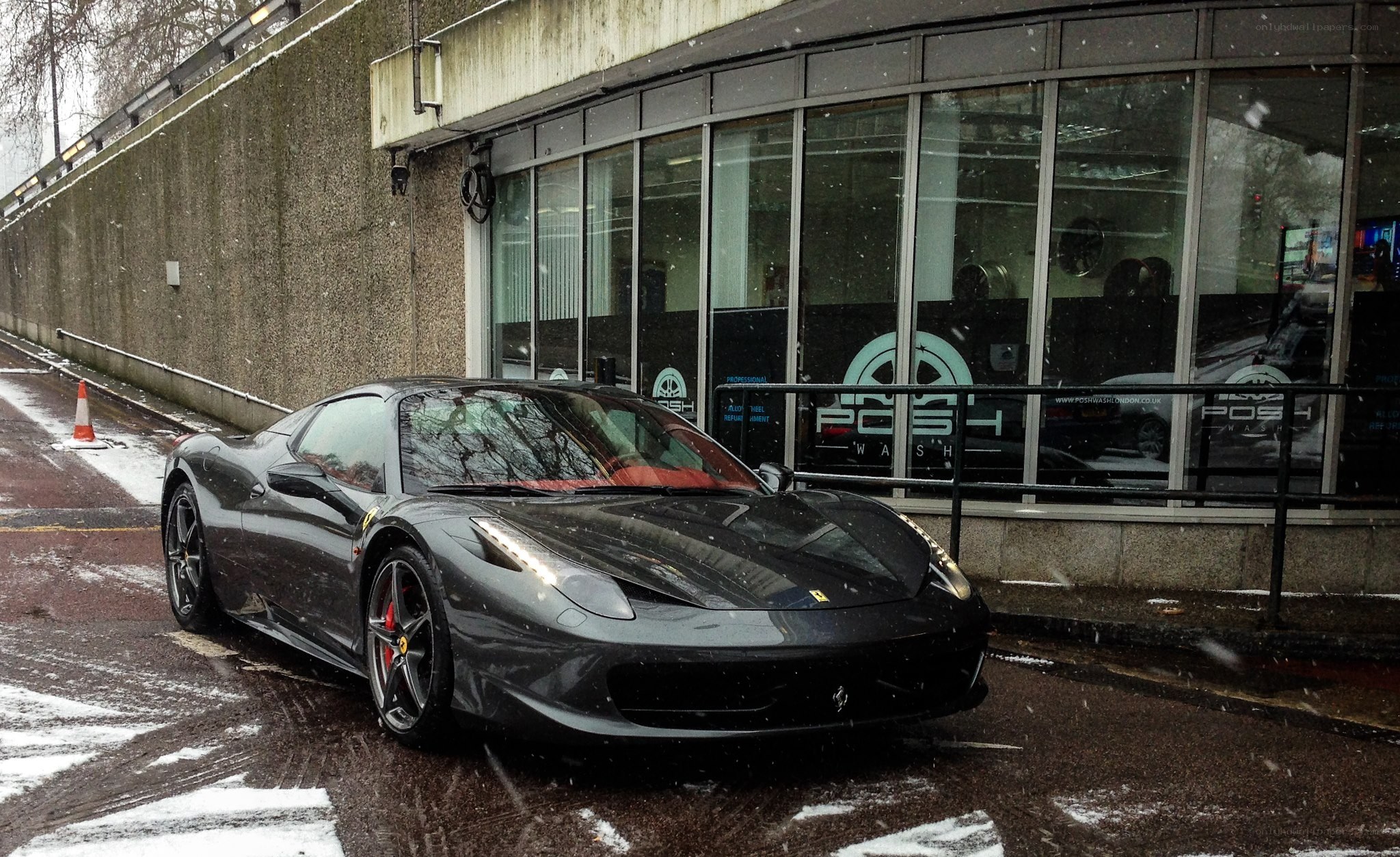 Black Ferrari in snow