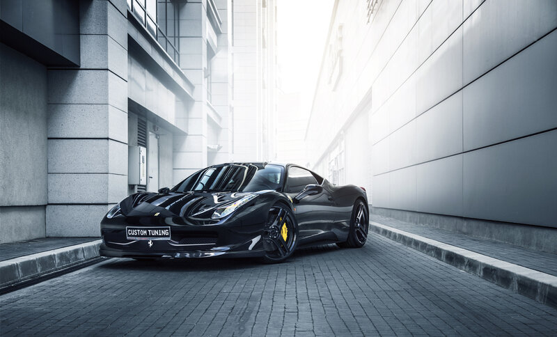 Black Ferrari in urban alley