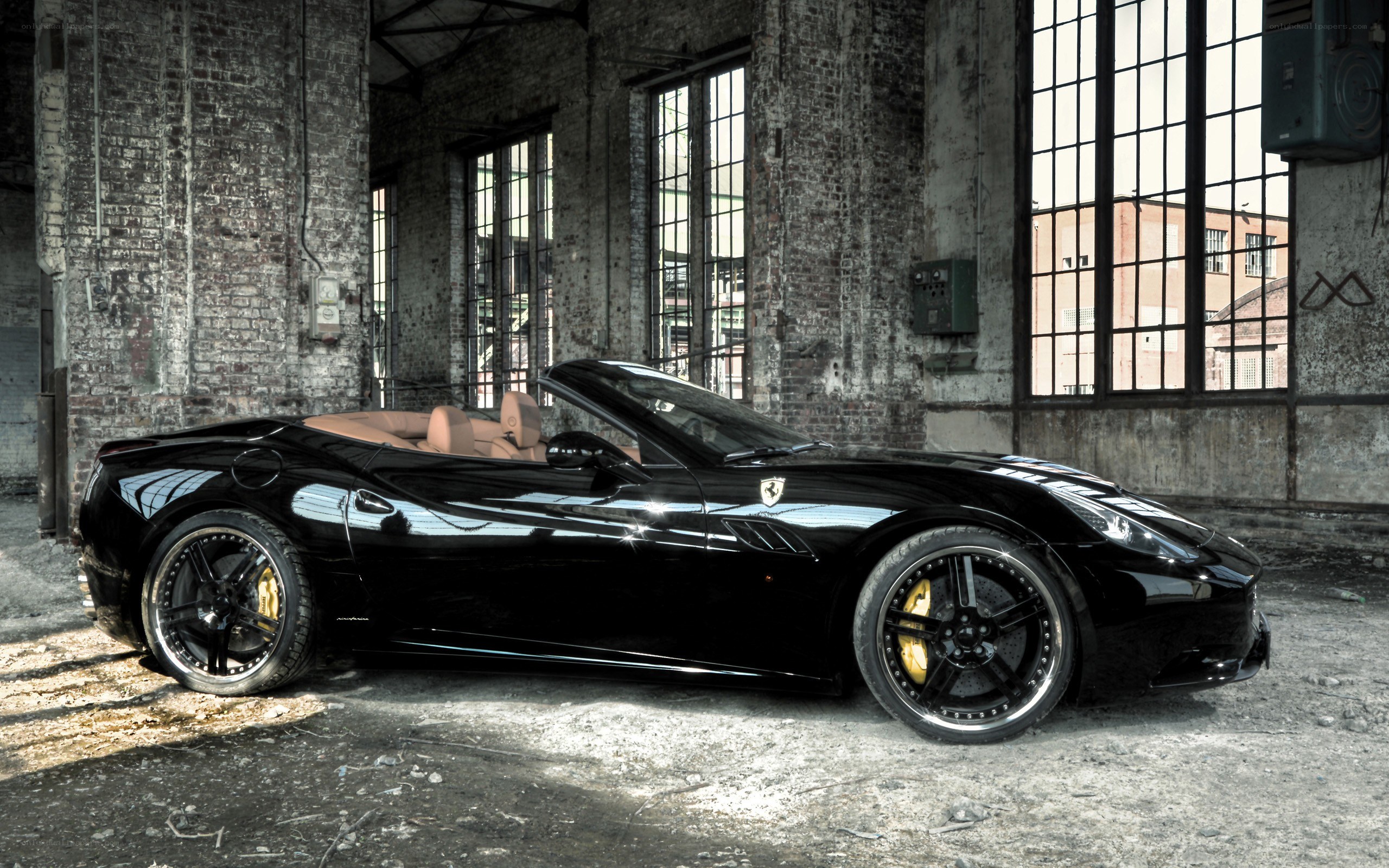 Black Ferrari in warehouse