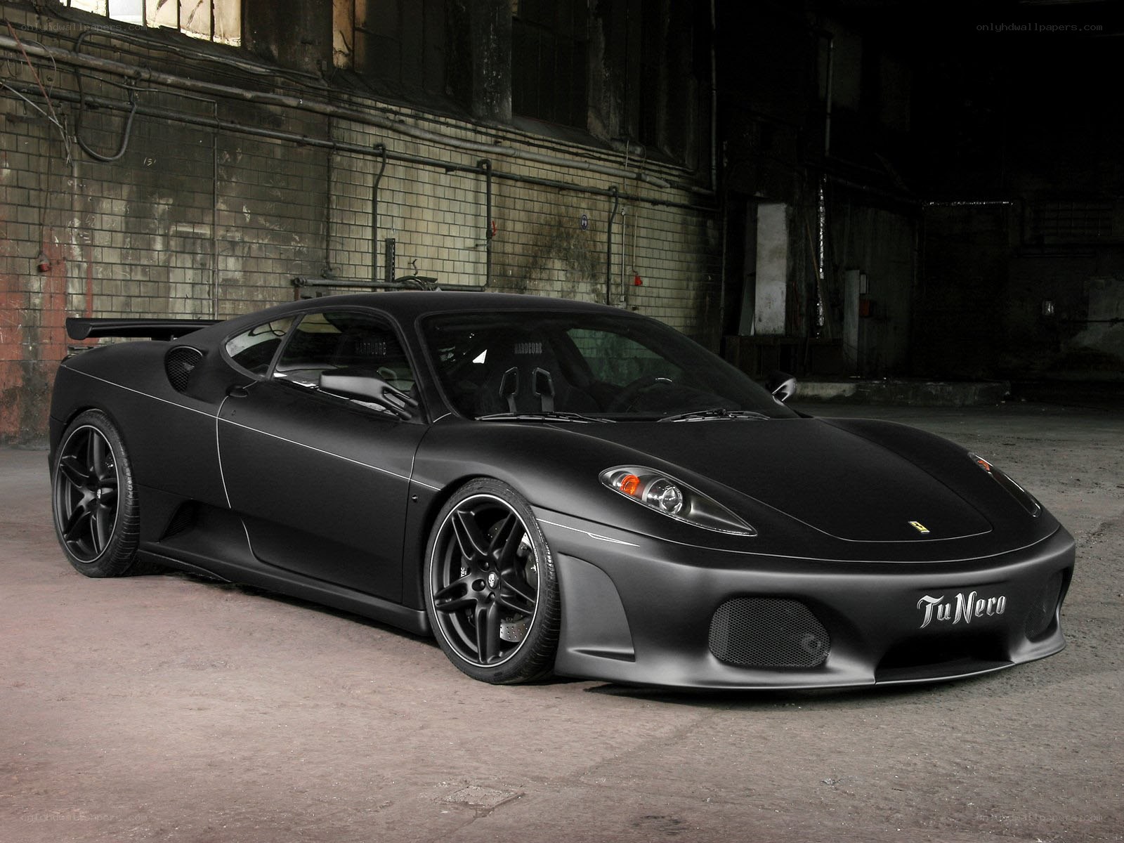 Black Ferrari in warehouse