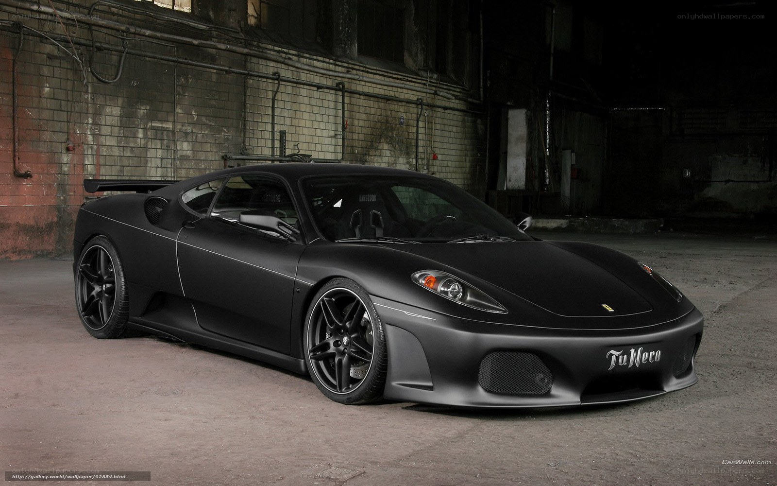 Black Ferrari in warehouse