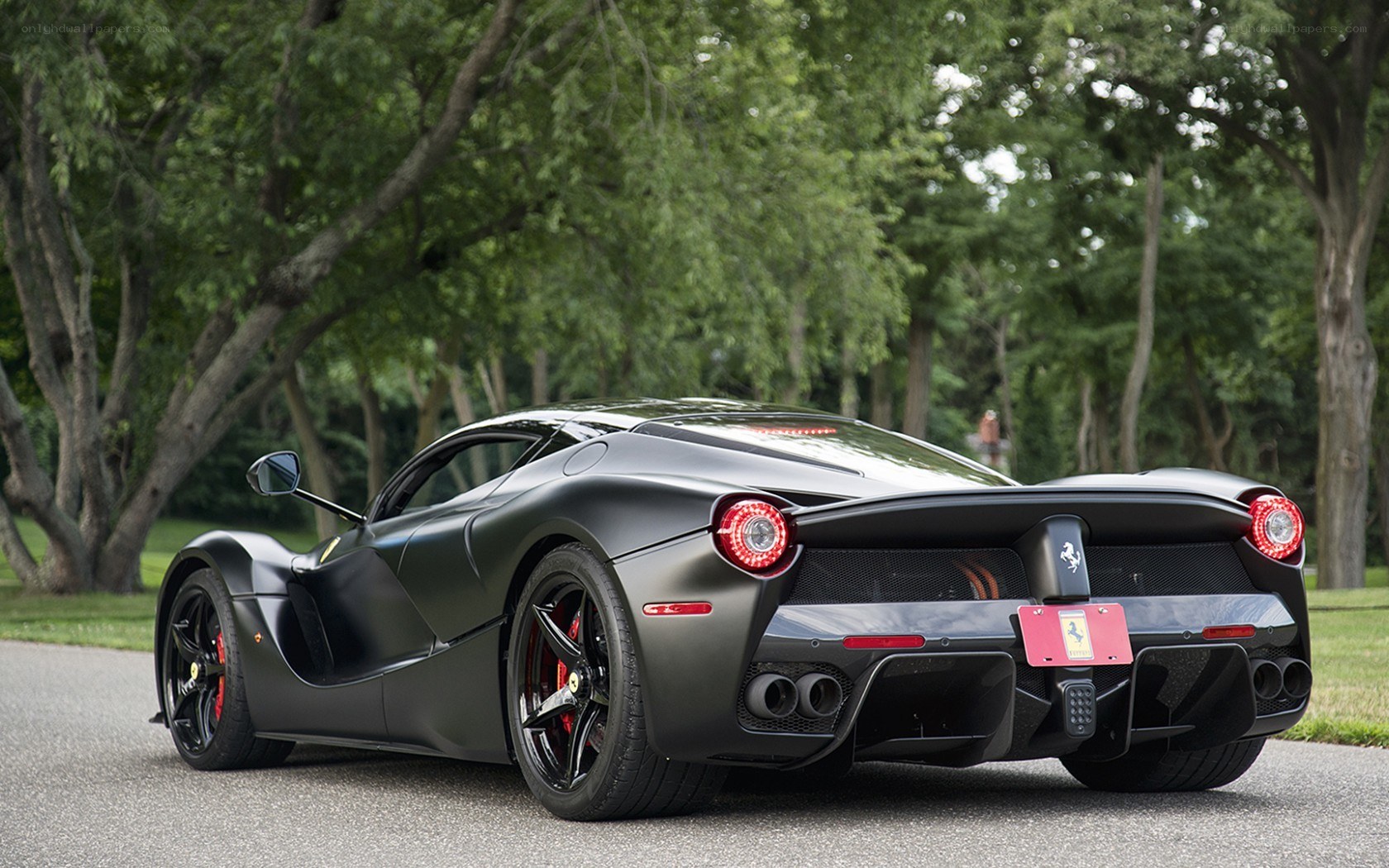 Black Ferrari LaFerrari on a road