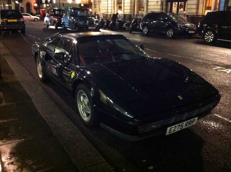 Black Ferrari on a city street