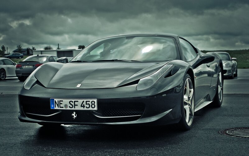 Black Ferrari on a cloudy day