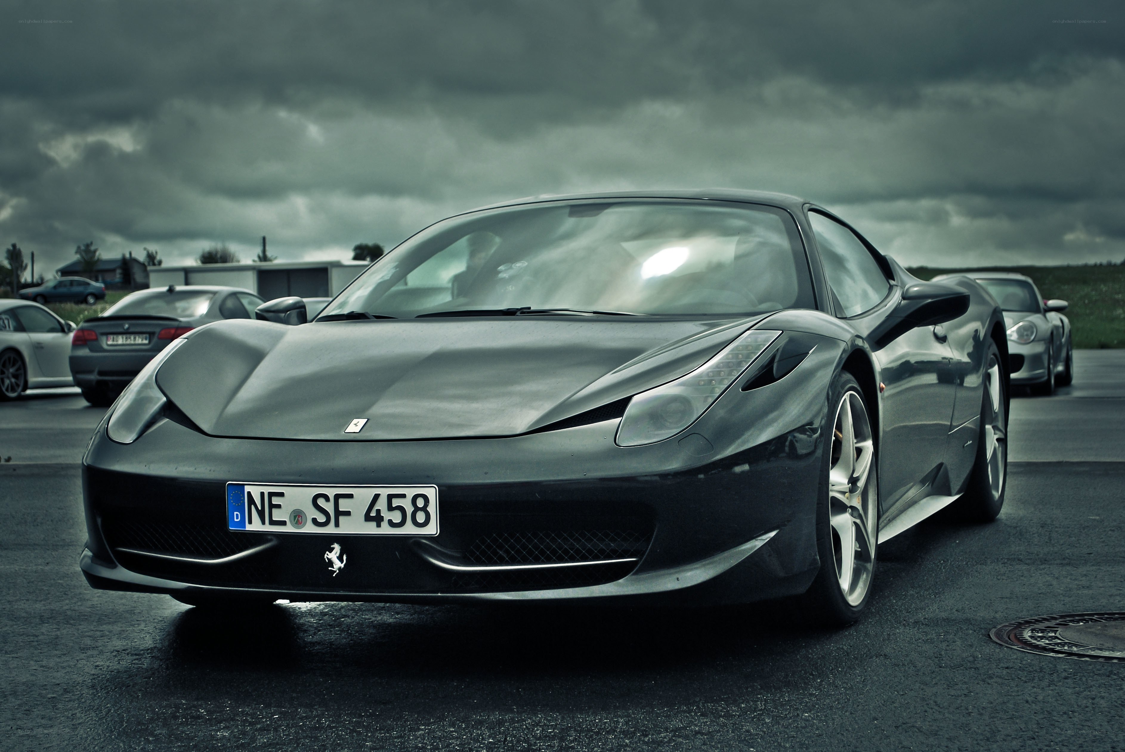 Black Ferrari on a cloudy day