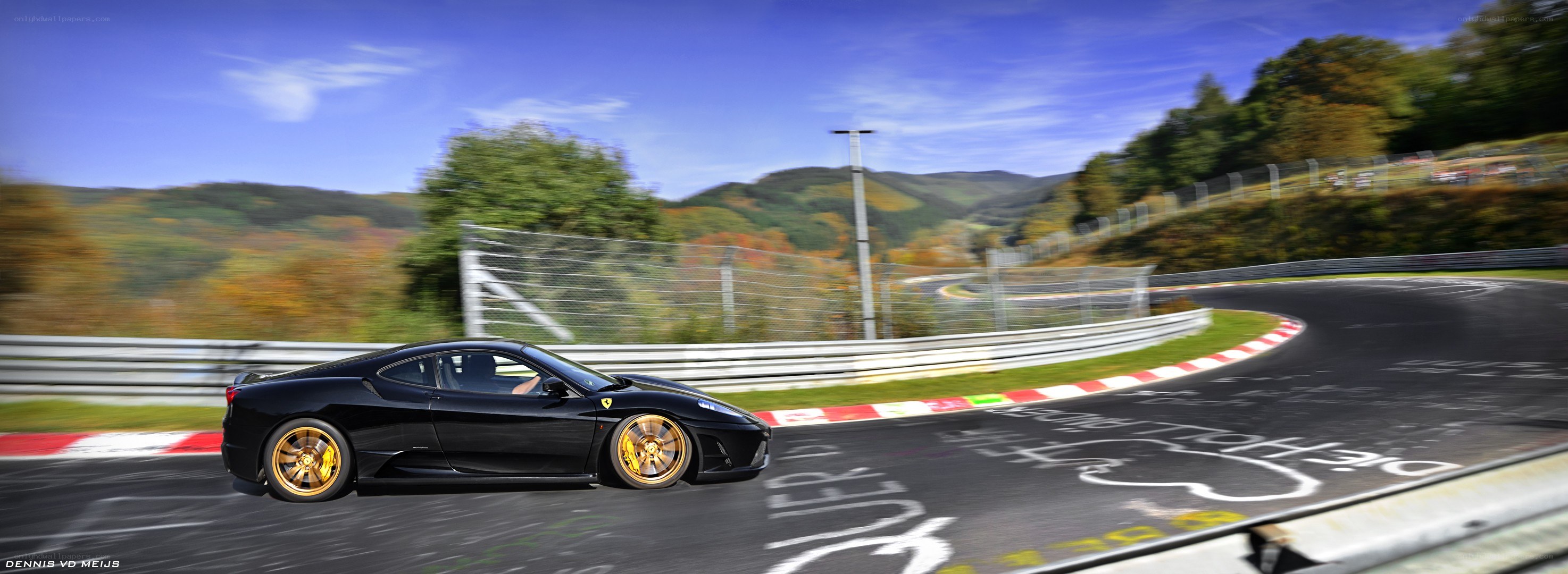 Black Ferrari on a racetrack
