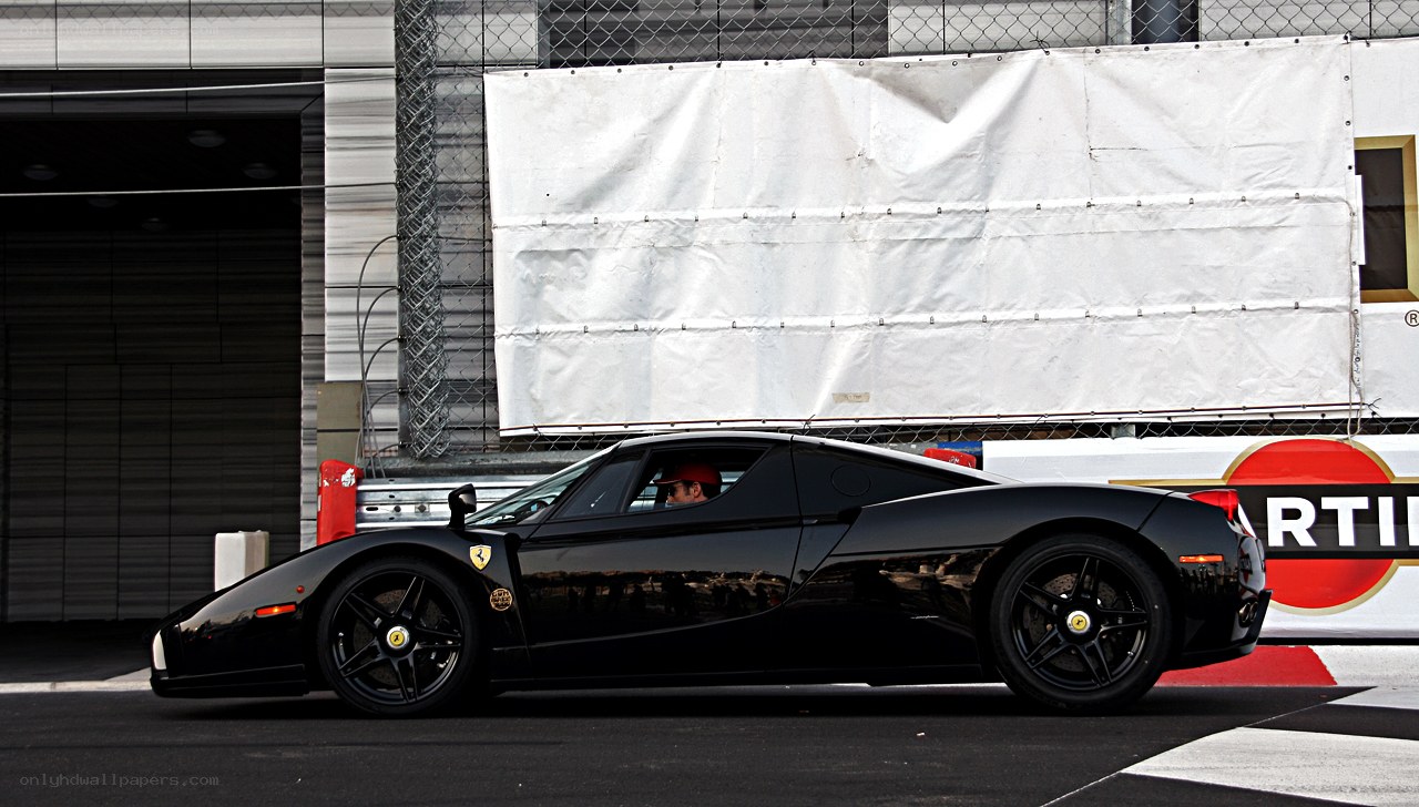 Black Ferrari on a racetrack