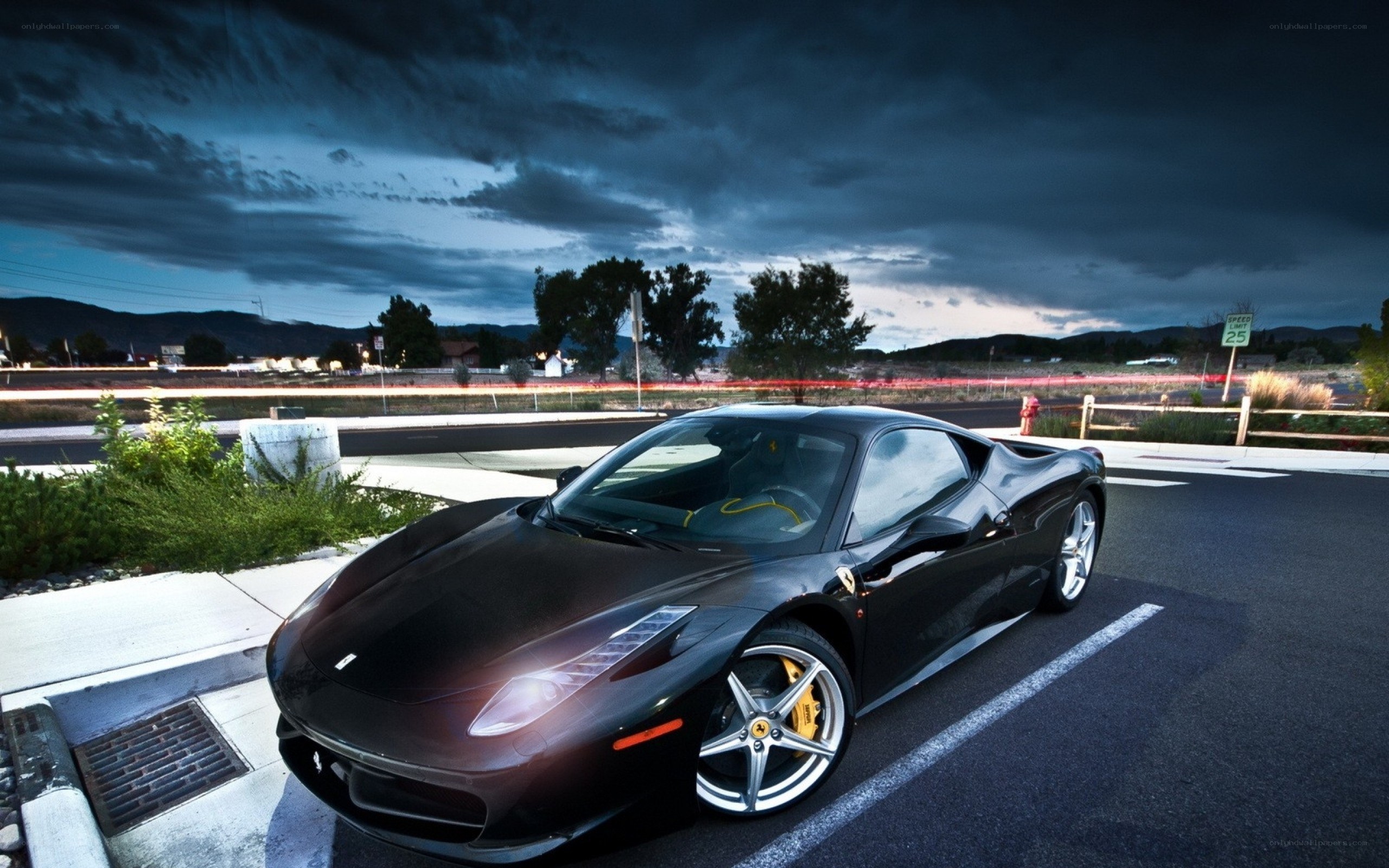 Black Ferrari on a stormy evening