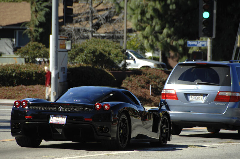 Black Ferrari on city street