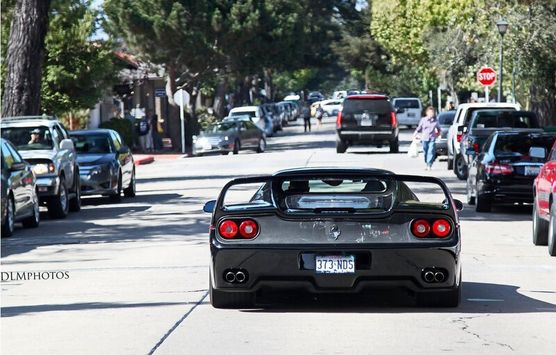 black ferrari on city street