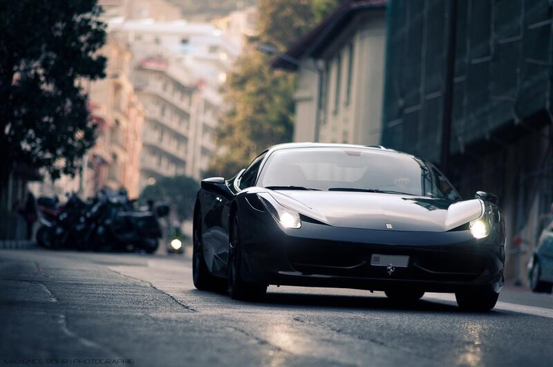 Black Ferrari on city street