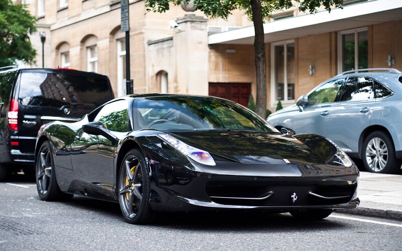 Black Ferrari on city street