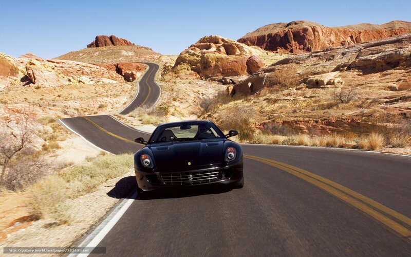 Black Ferrari on desert road