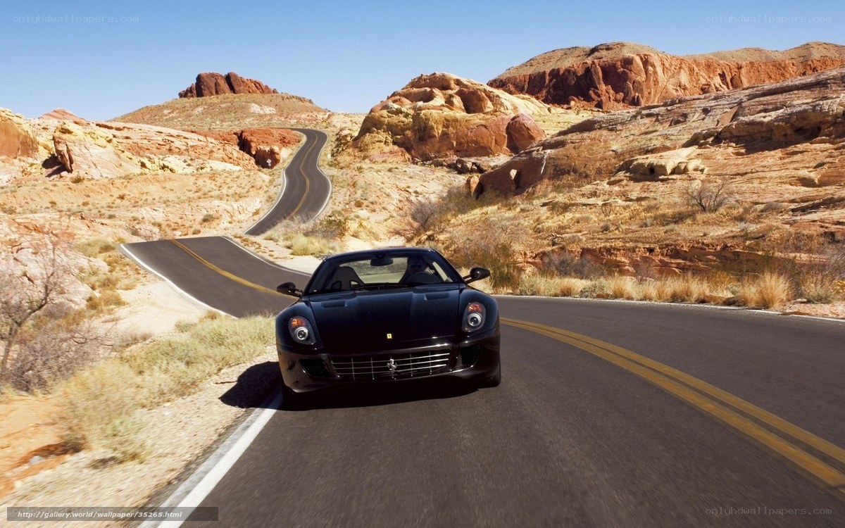 Black Ferrari on desert road