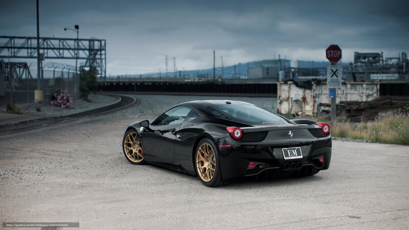 Black Ferrari on industrial road