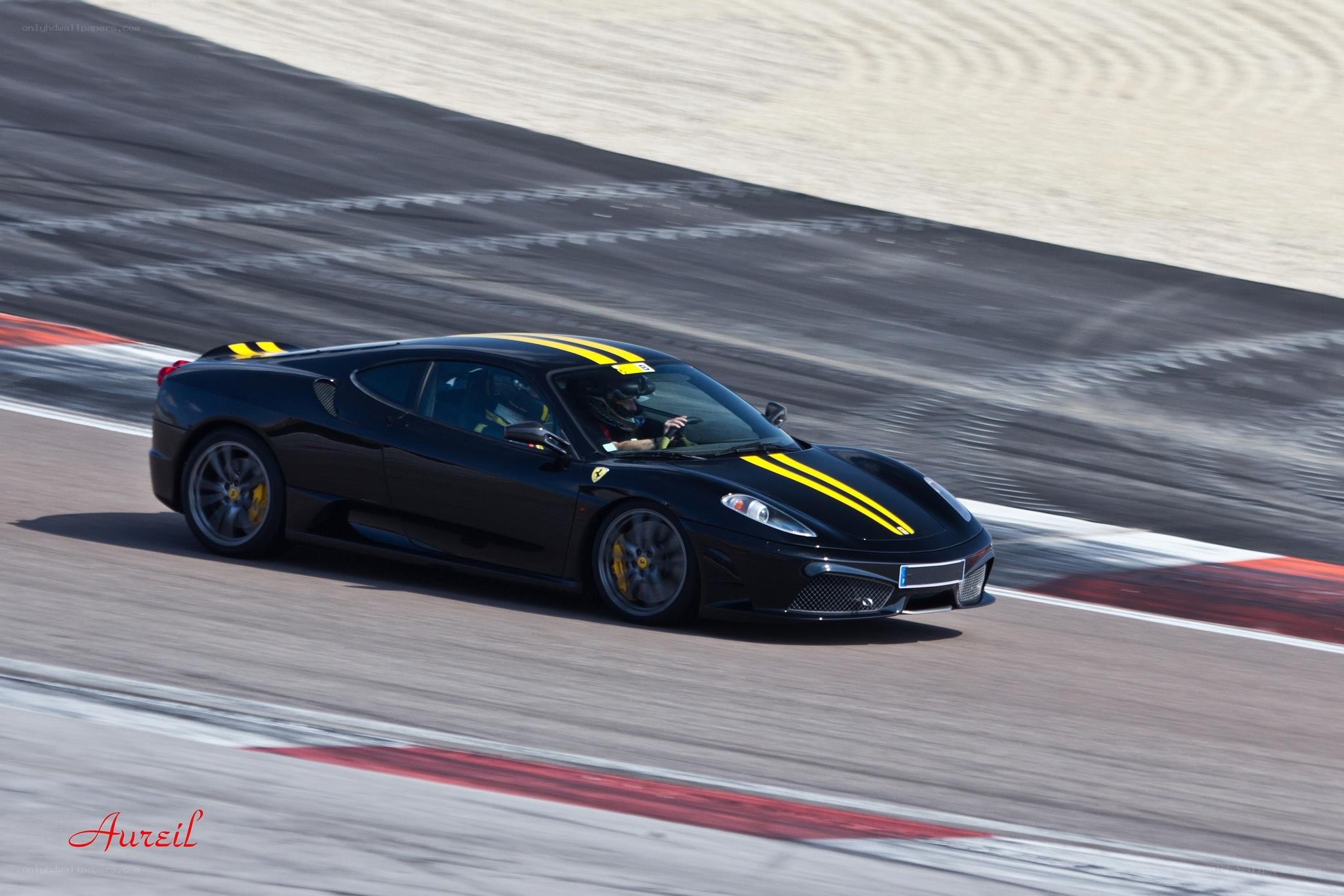 Black Ferrari on racetrack
