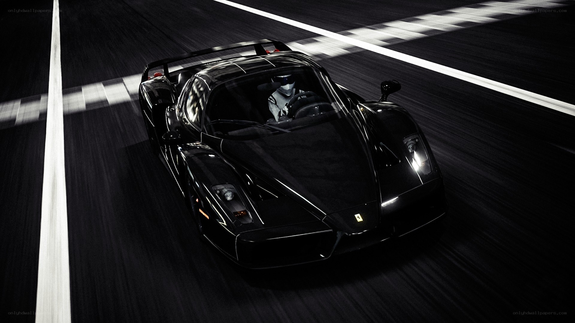 black ferrari on racetrack