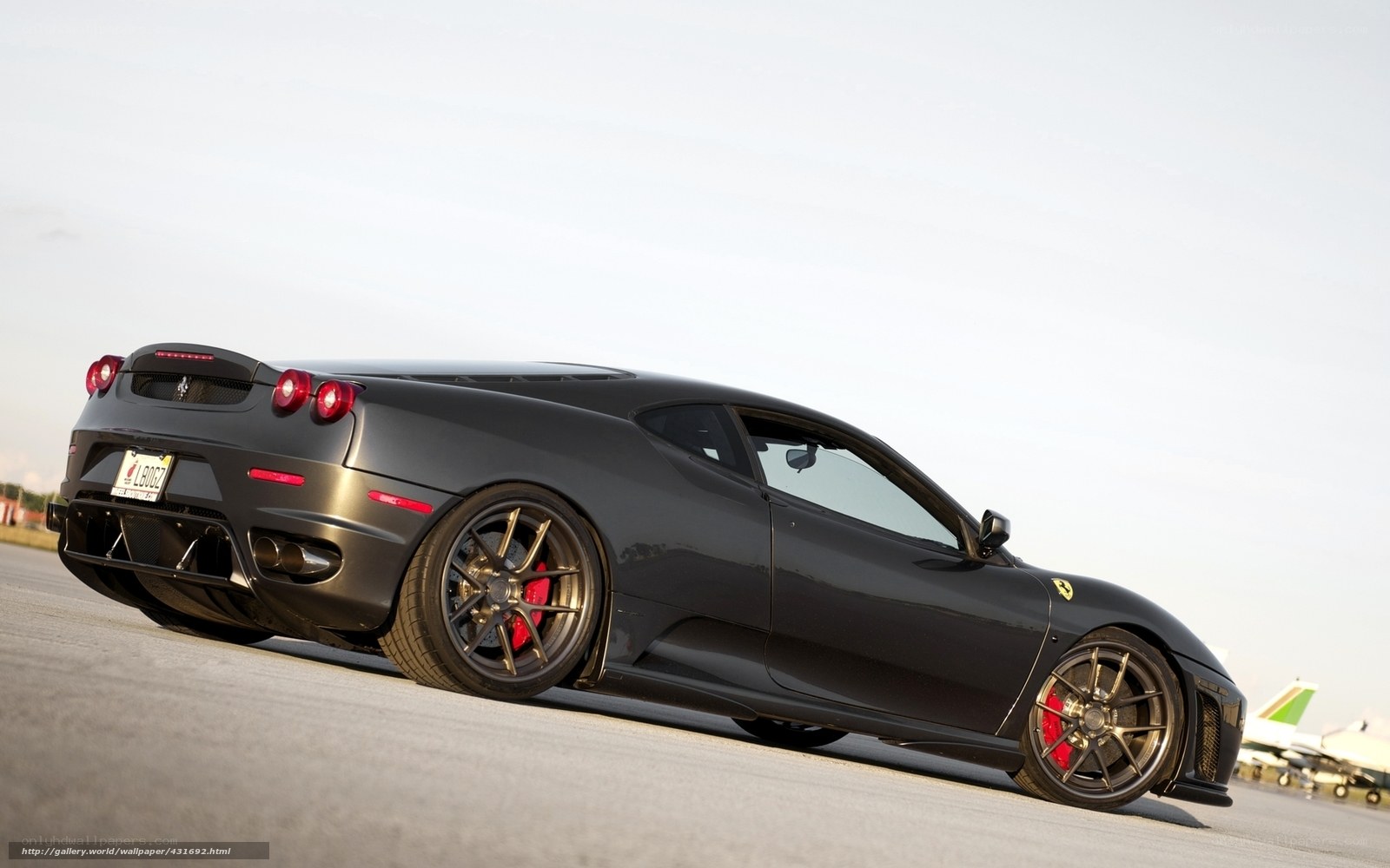 Black Ferrari on tarmac